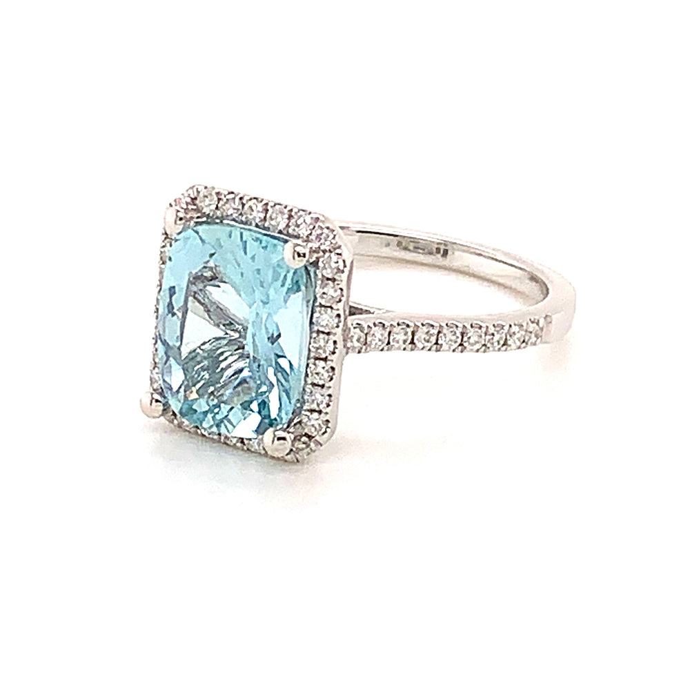 Aquamarine and Diamond Halo Ring